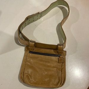 Launch - Raw Hand Stitched Leather with Adjustable & Removable Belt.